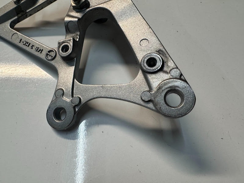 Yamaha YZF R1 2009-2011 RH Foot Peg Bracket OEM Genuine 14B-27443-00