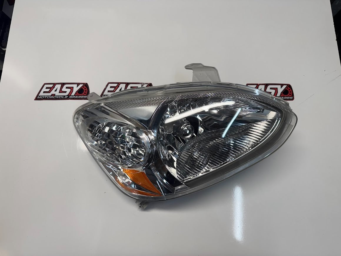 RH Headlamp Unit Assy 81130-52310 Toyota Echo 4 door sedan 8/02-9/05 NEW