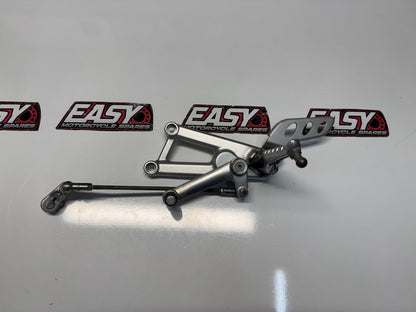Aprilia RS4 125 4T 2011-2016 LH Foot Peg Assembly Rear Set OEM Genuine 899558