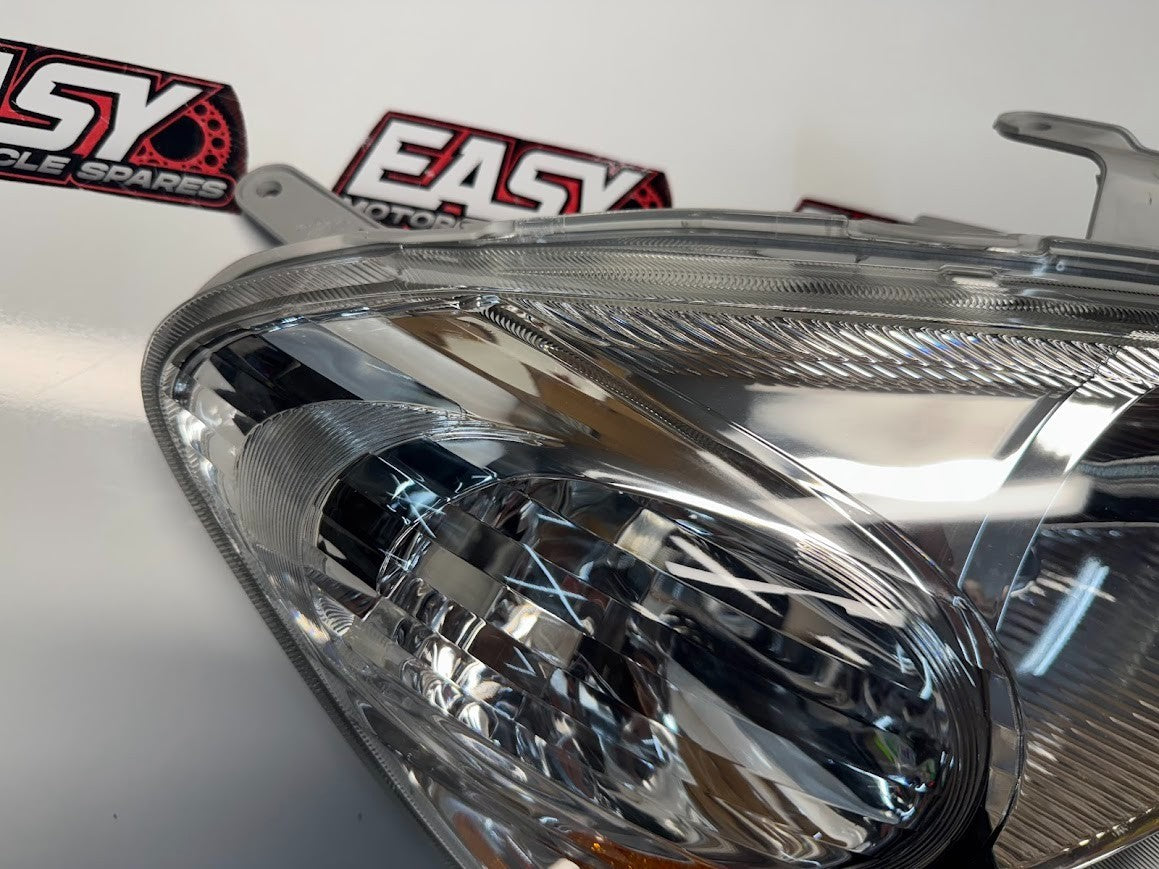 RH Headlamp Unit Assy 81130-52310 Toyota Echo 4 door sedan 8/02-9/05 NEW