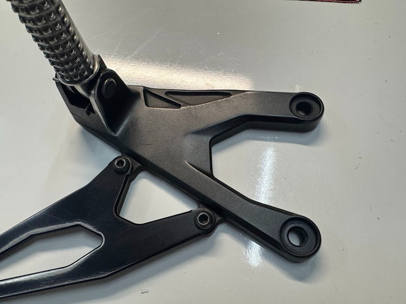 Yamaha YZF R1 2015-2025 LH Riders Peg Bracket Rear Set OEM Genuine 2CR-27442-00