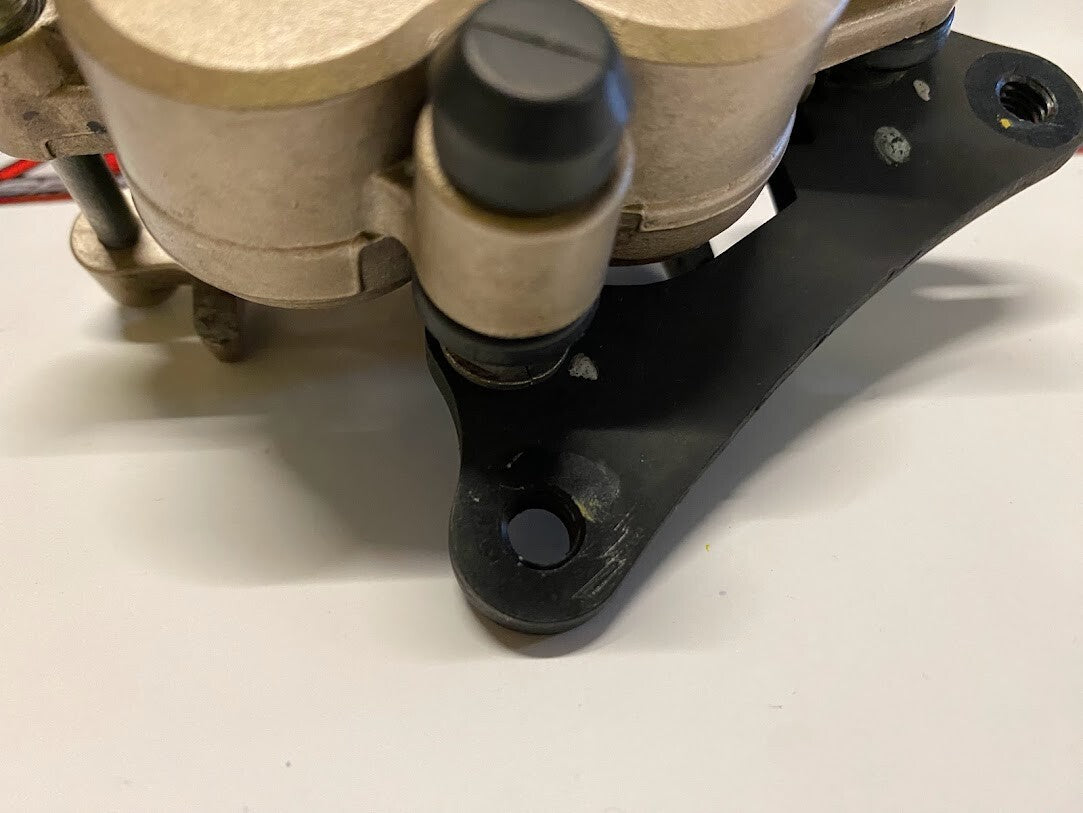 Front Brake Caliper and Holder Honda CBR 125R 2009