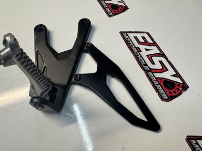 Yamaha YZF R1 2015-2025 LH Riders Peg Bracket Rear Set OEM Genuine 2CR-27442-00