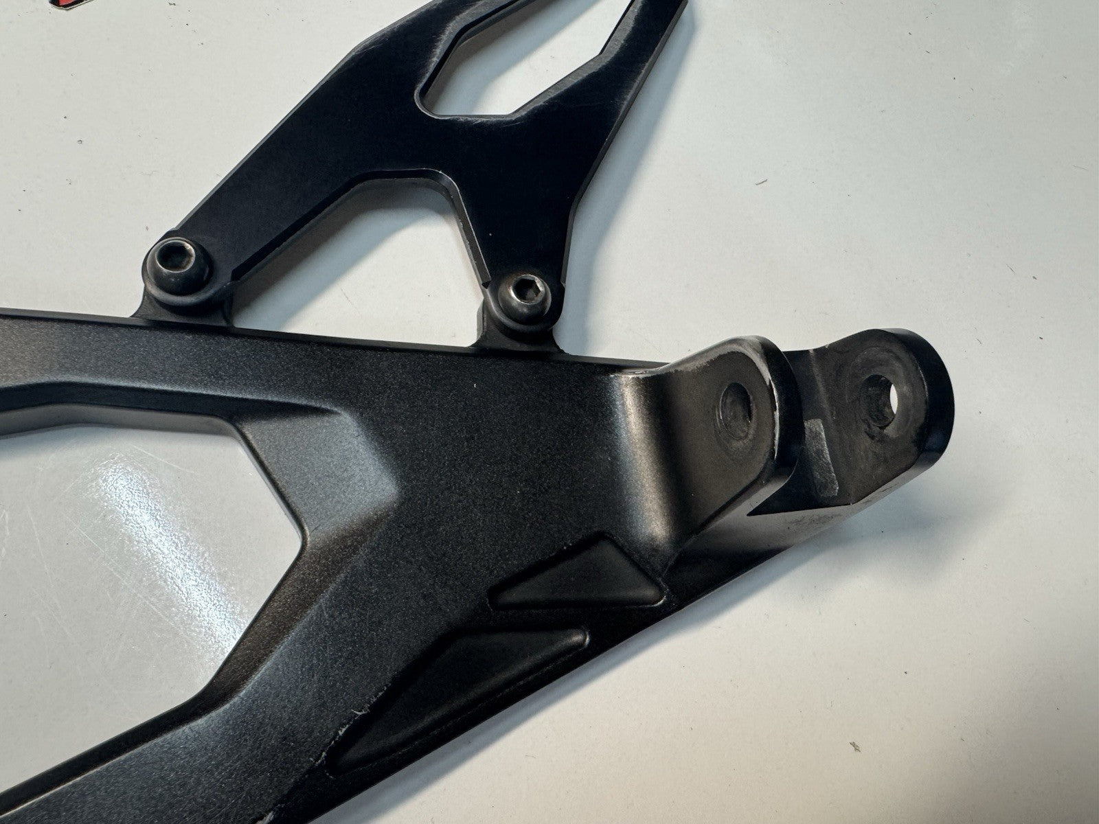 Yamaha YZF R1 2015-2025 LH Foot Peg Bracket Rear Set OEM Genuine 2CR-27442-00